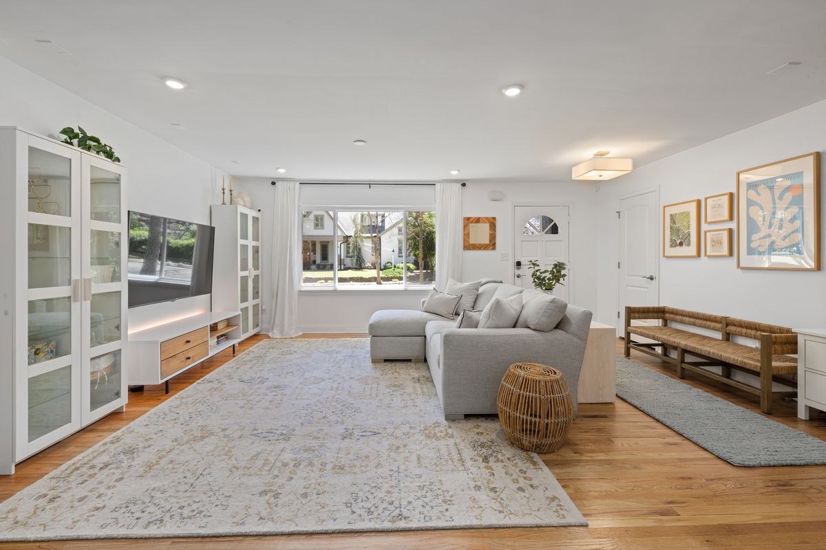 Bright finished living room with freshly painted walls and ceiling